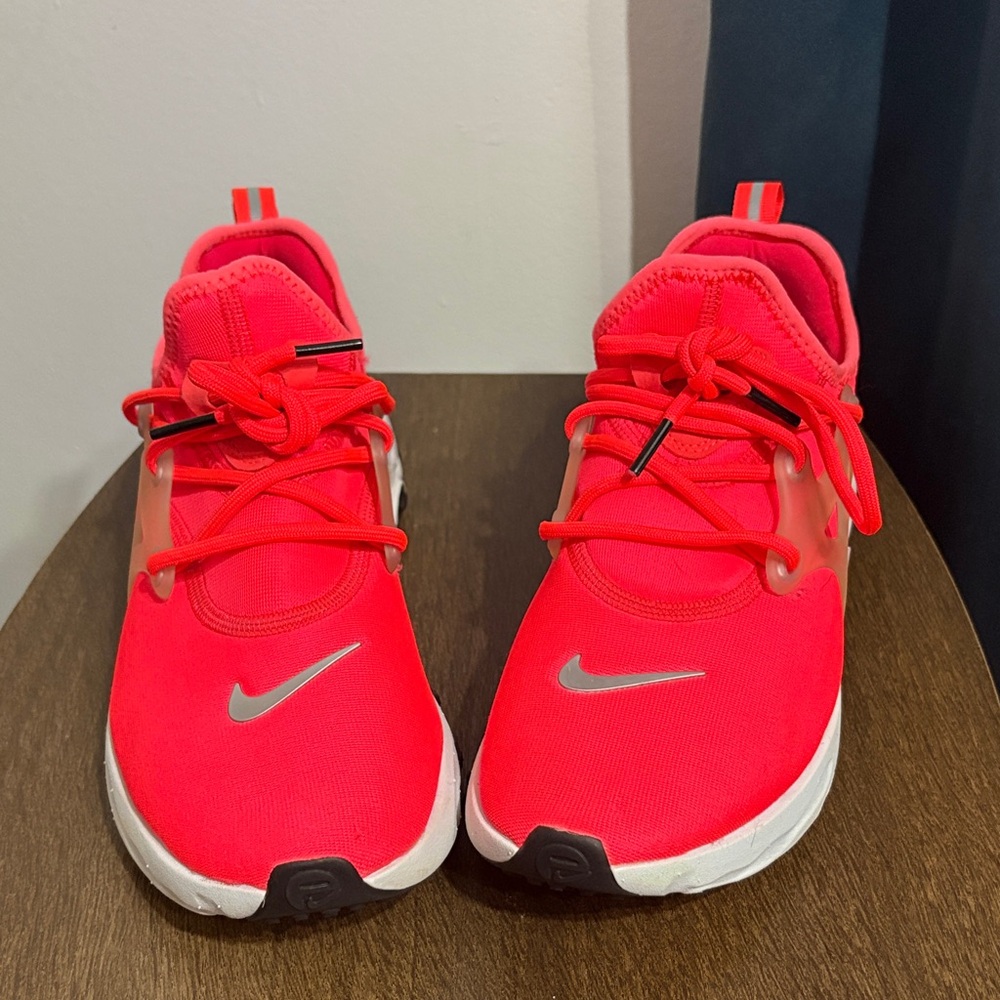 Bright pink Nike shoes
